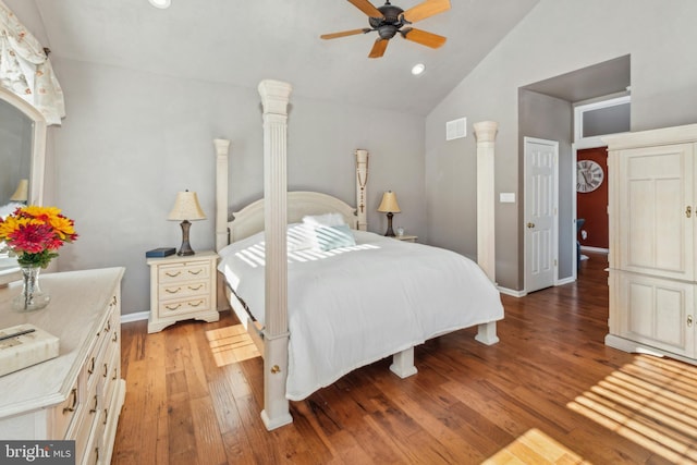 bedroom featuring vaulted ceiling, ceiling fan, and light hardwood / wood-style flooring