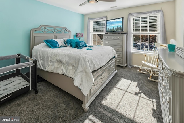 carpeted bedroom with ceiling fan