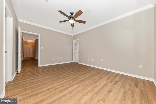 unfurnished bedroom with light hardwood / wood-style flooring, ceiling fan, and ornamental molding