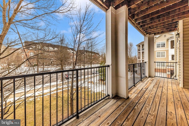 view of snow covered deck