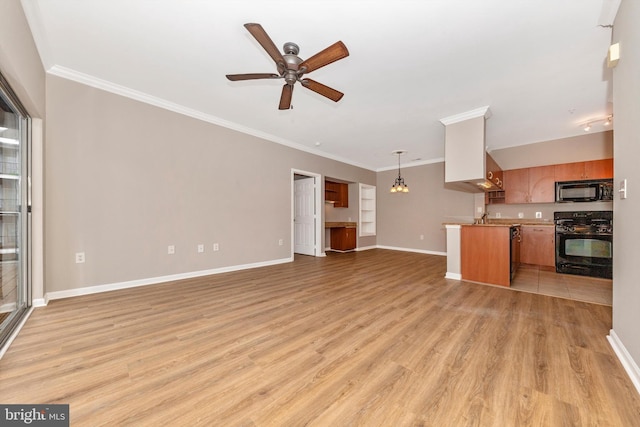 unfurnished living room with sink, ceiling fan, light hardwood / wood-style flooring, and ornamental molding