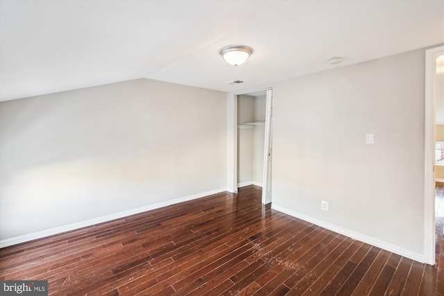 empty room featuring dark hardwood / wood-style floors