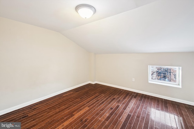 bonus room featuring hardwood / wood-style floors and lofted ceiling