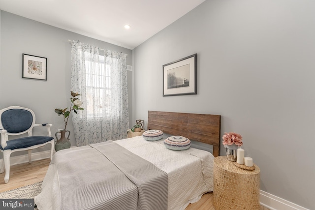 bedroom with light wood-type flooring