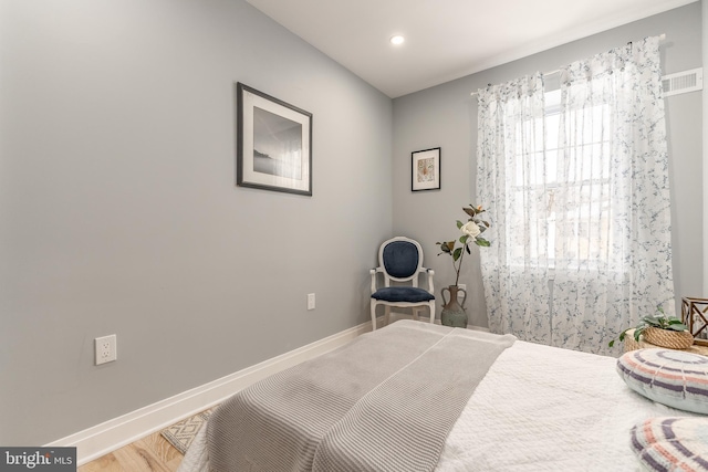 bedroom featuring hardwood / wood-style floors