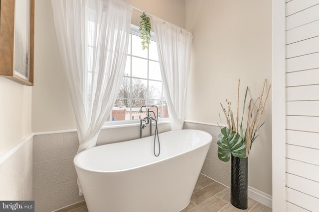 bathroom featuring a tub