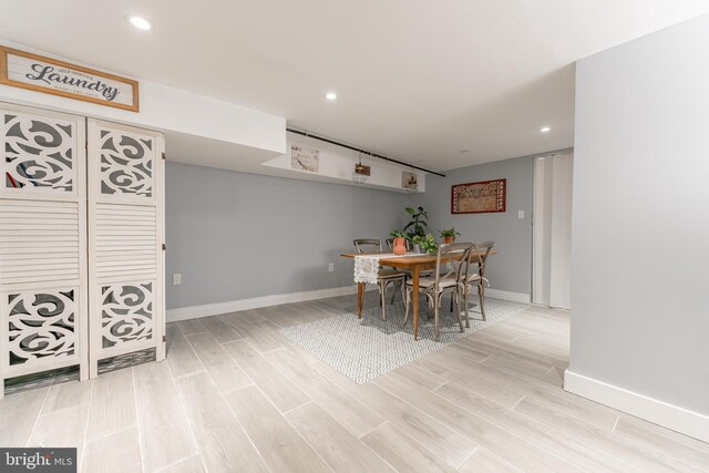 dining space featuring light hardwood / wood-style flooring