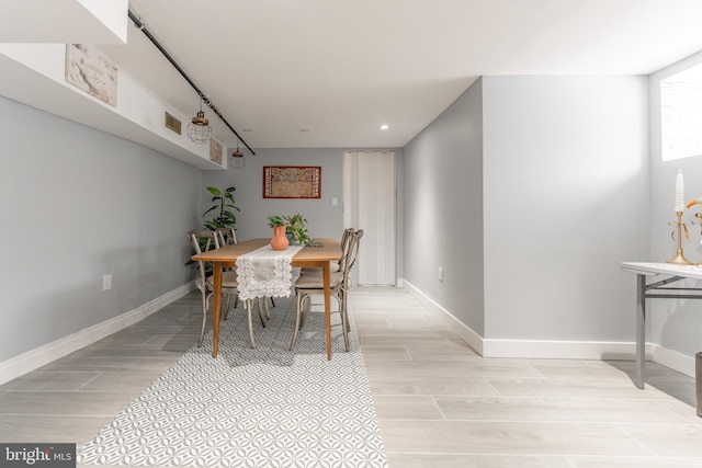 dining space featuring light hardwood / wood-style floors