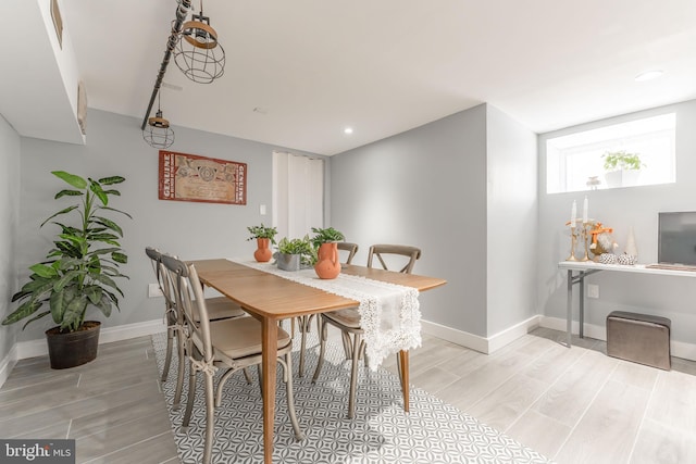 dining room with light hardwood / wood-style floors