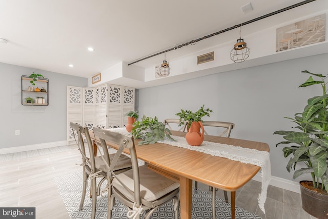 dining area featuring light hardwood / wood-style floors