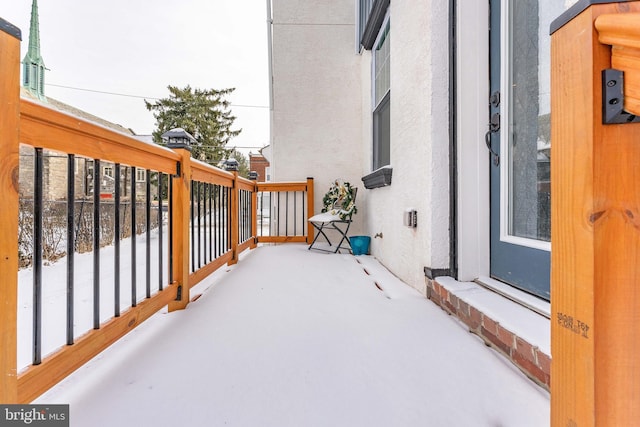 view of snow covered patio