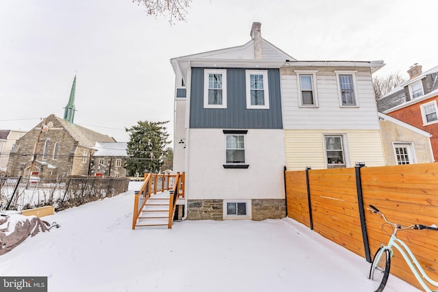 view of snow covered property