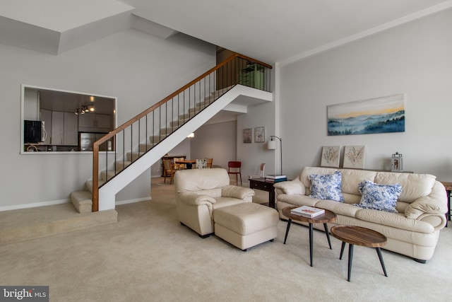 living room featuring light carpet