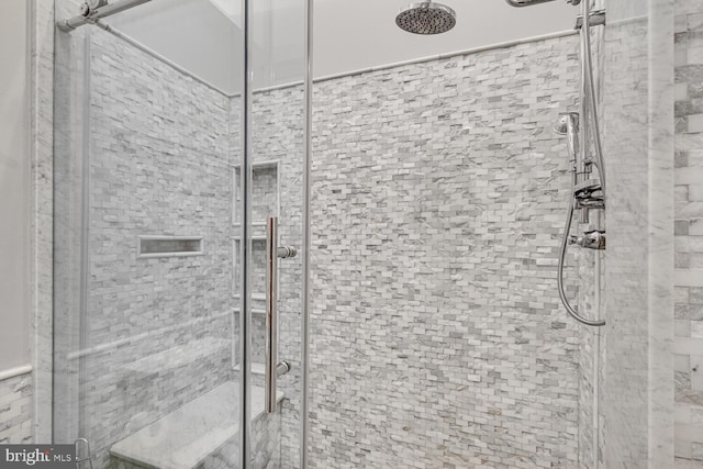 bathroom with an enclosed shower