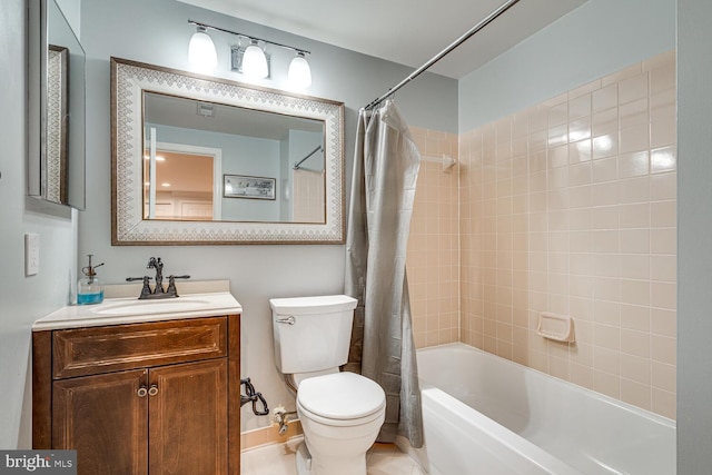 full bathroom with vanity, toilet, and shower / bath combo