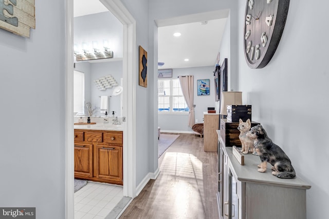 hall featuring light hardwood / wood-style floors