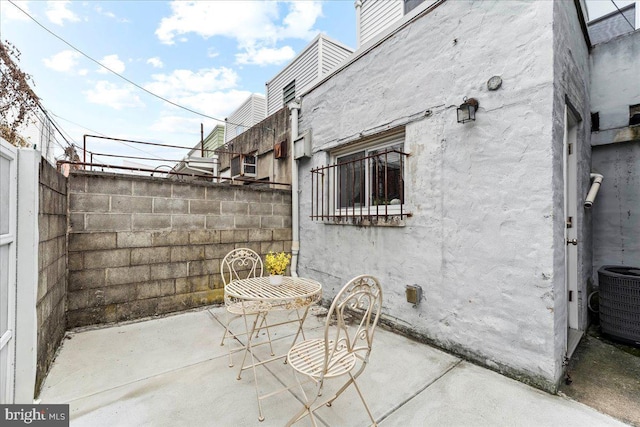 view of patio with central air condition unit