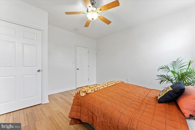 bedroom featuring ceiling fan and light wood-type flooring