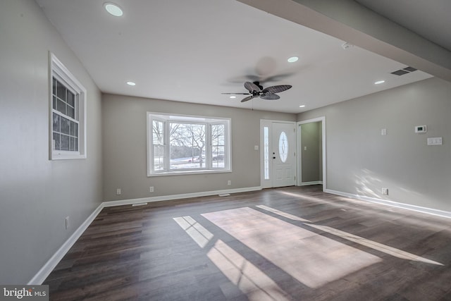 interior space featuring ceiling fan and dark hardwood / wood-style floors