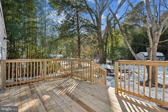 view of snow covered deck