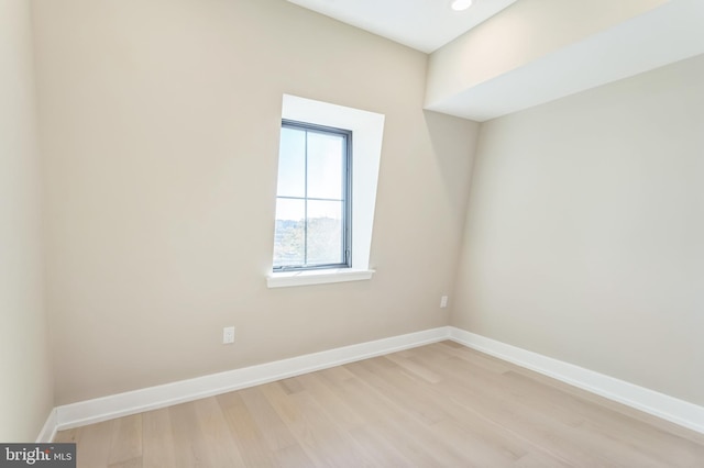 bonus room with light hardwood / wood-style floors