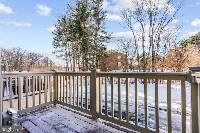 view of snow covered deck