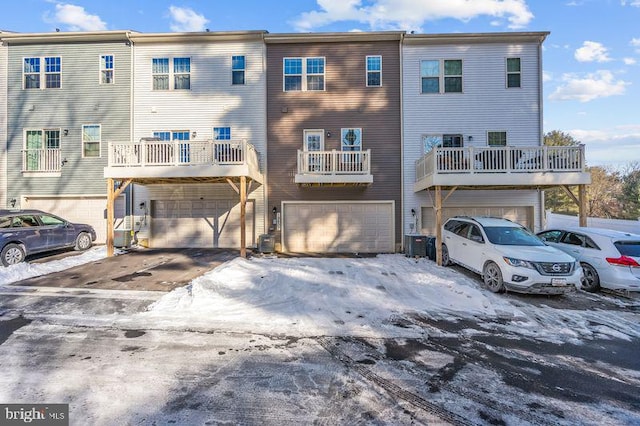 rear view of property with a balcony