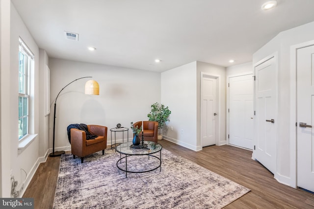 living area featuring hardwood / wood-style floors