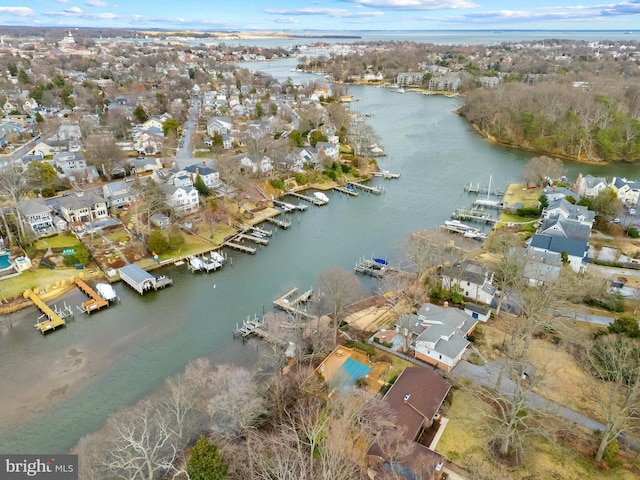 aerial view with a water view and a residential view