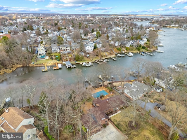 aerial view featuring a water view and a residential view