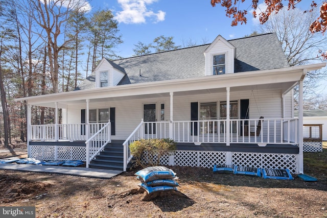 view of front of house featuring a porch and roof with shingles