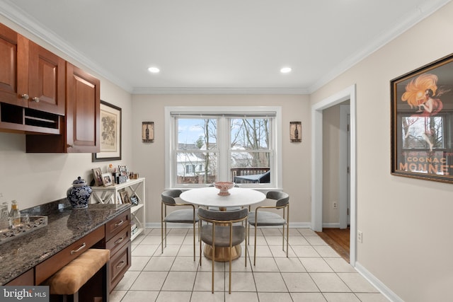 tiled dining space with crown molding