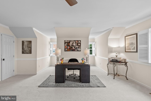 office area featuring ceiling fan, light colored carpet, and ornamental molding