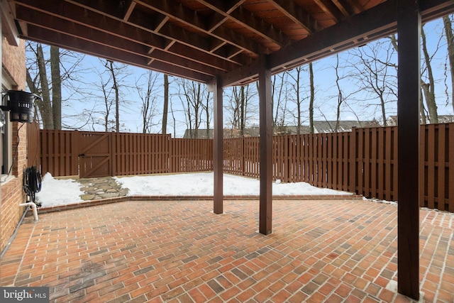 view of snow covered patio