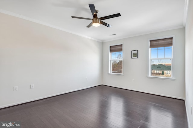 unfurnished room with crown molding, ceiling fan, and dark hardwood / wood-style floors