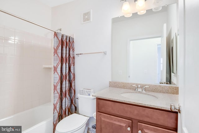 full bathroom featuring vanity, shower / bath combo, and toilet