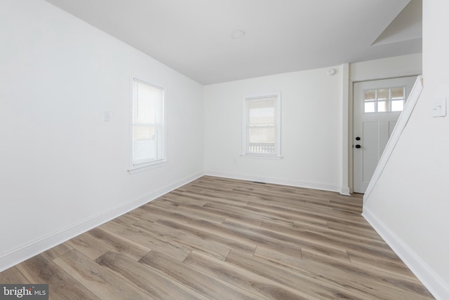 empty room featuring light hardwood / wood-style floors