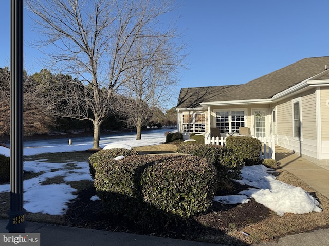 view of yard covered in snow