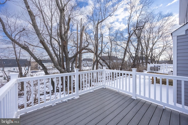 view of snow covered deck