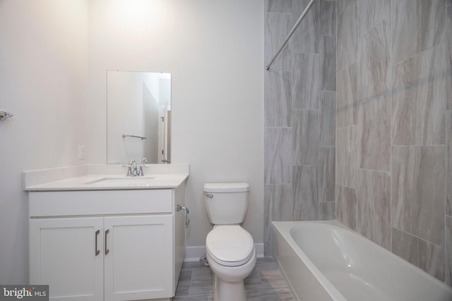 full bathroom featuring shower / tub combination, vanity, tile patterned floors, and toilet