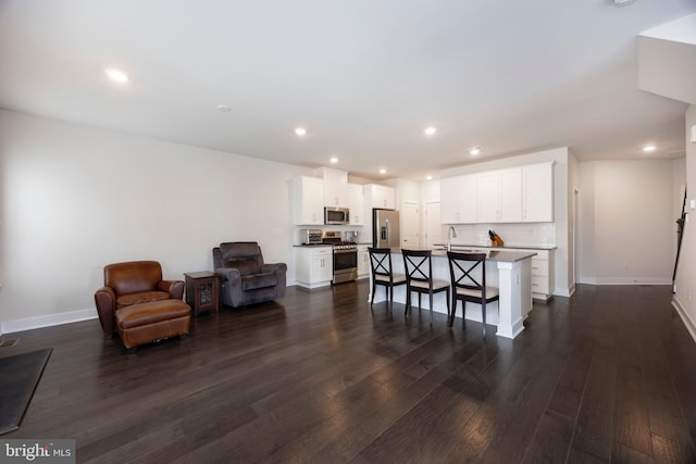 interior space featuring dark hardwood / wood-style flooring and sink