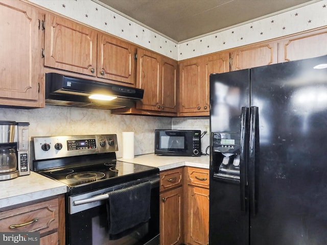 kitchen with backsplash and black appliances