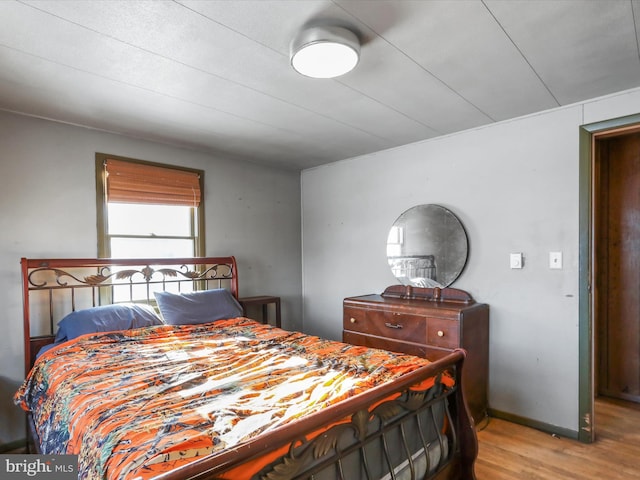 bedroom with light wood-type flooring