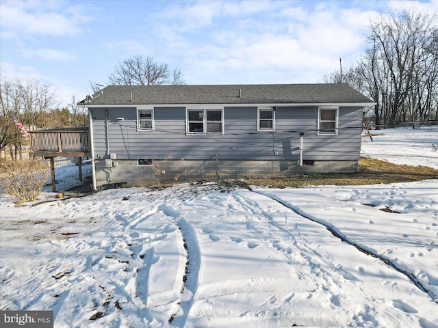 view of front of house featuring a wooden deck