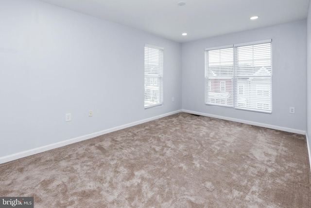 view of carpeted spare room