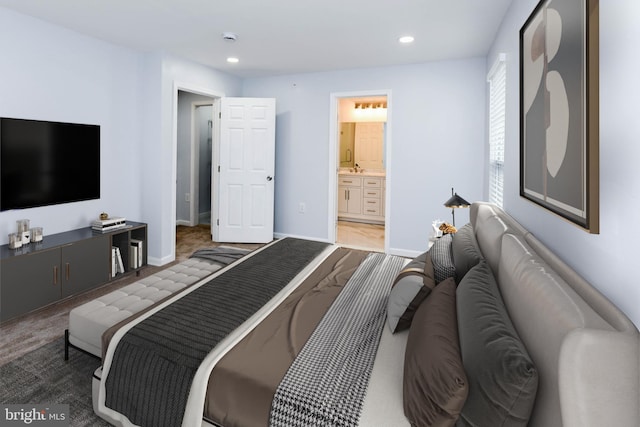 bedroom featuring connected bathroom