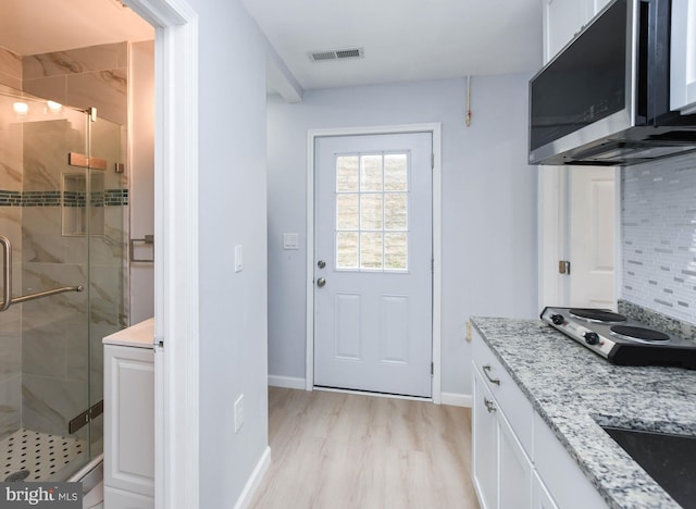 entryway featuring light hardwood / wood-style flooring