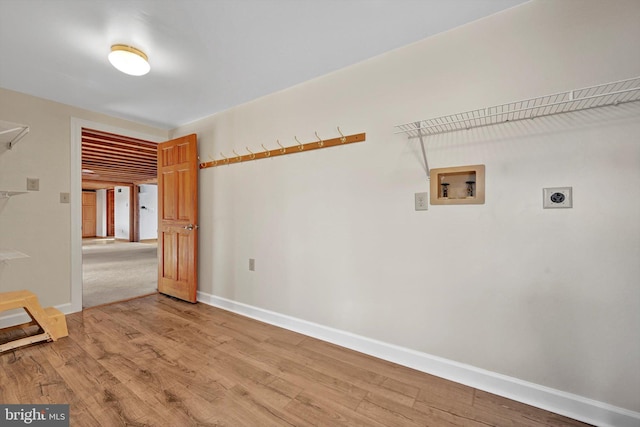 spare room featuring hardwood / wood-style flooring