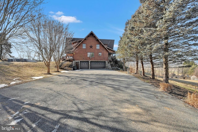 exterior space with a garage