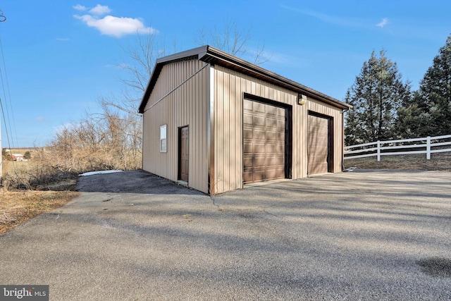 view of outbuilding with a garage